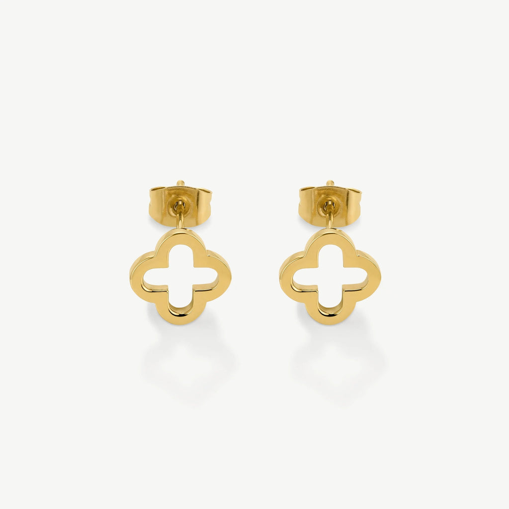 Pair of gold stud earrings with open quatrefoil design on white background