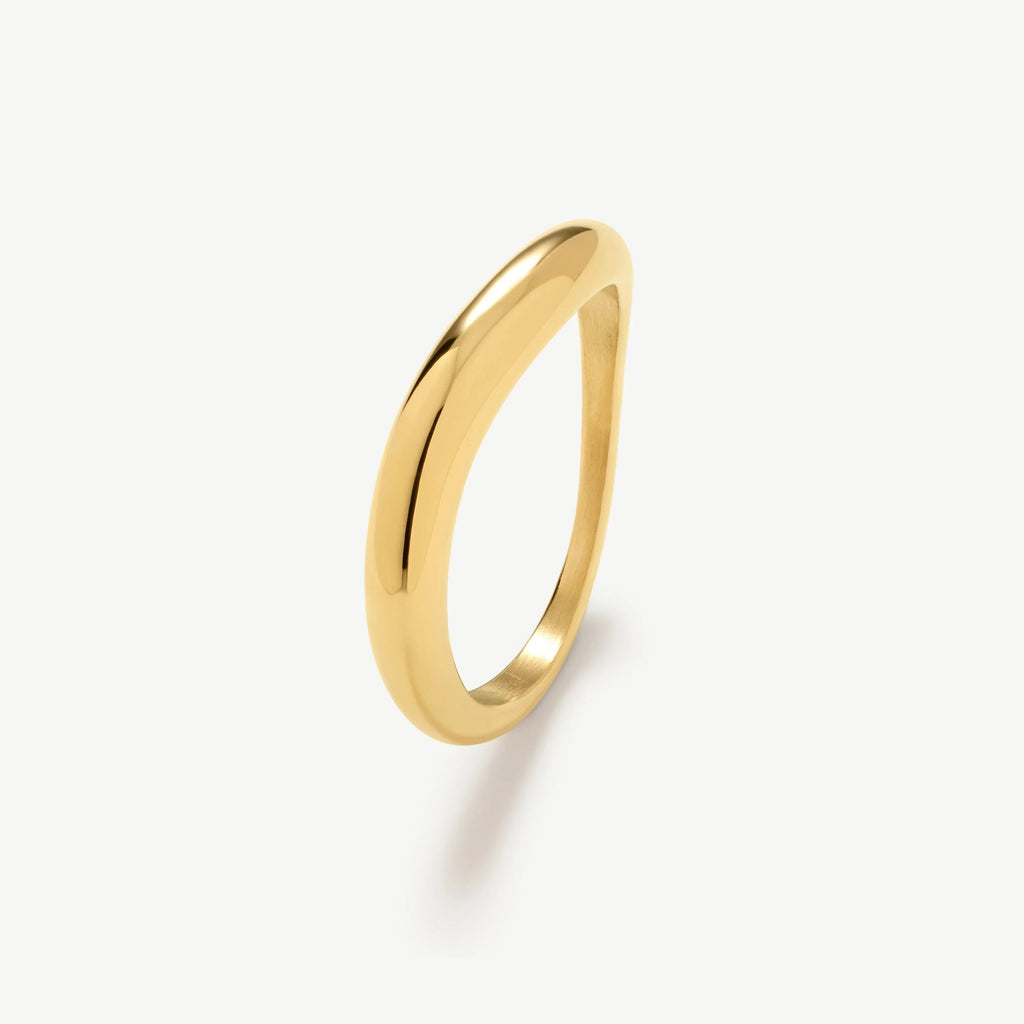 Sleek polished gold-tone curved band ring on white background